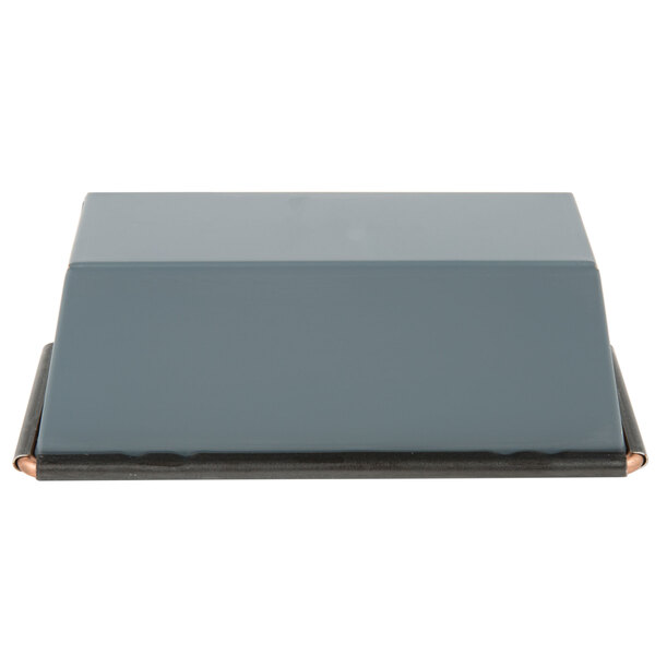 A gray rectangular Matfer Bourgeat bread loaf pan with copper corners.