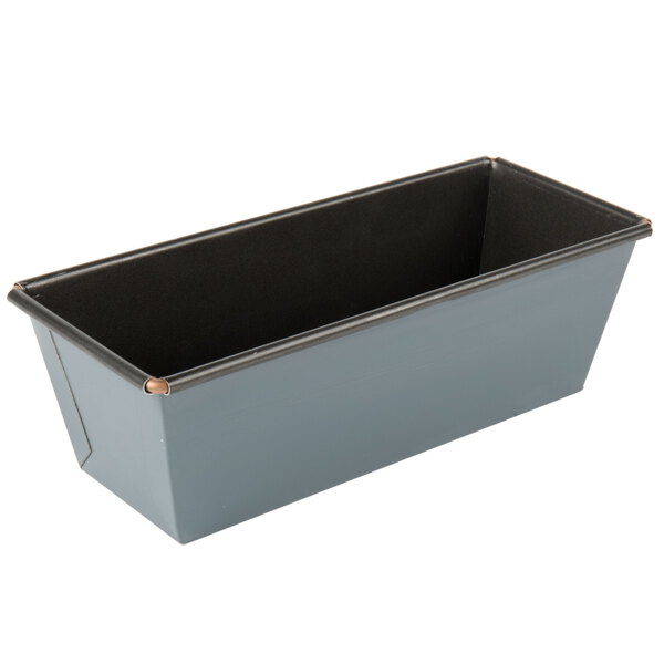 A black rectangular metal loaf pan with a flared black rim.