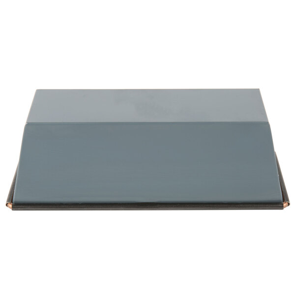 A grey rectangular Matfer Bourgeat bread loaf pan with a black lid.