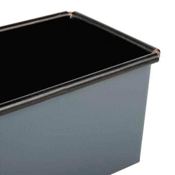 A black Matfer Bourgeat non-stick steel bread loaf pan.