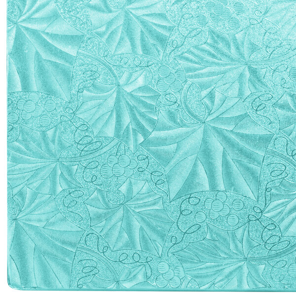 A close up of a blue surface on a Enjay blue square cake drum.