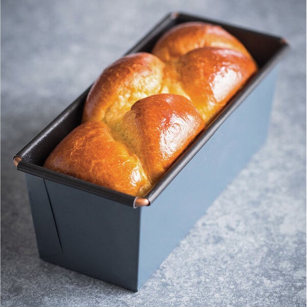 A loaf of bread in a Matfer Bourgeat steel non-stick loaf pan.