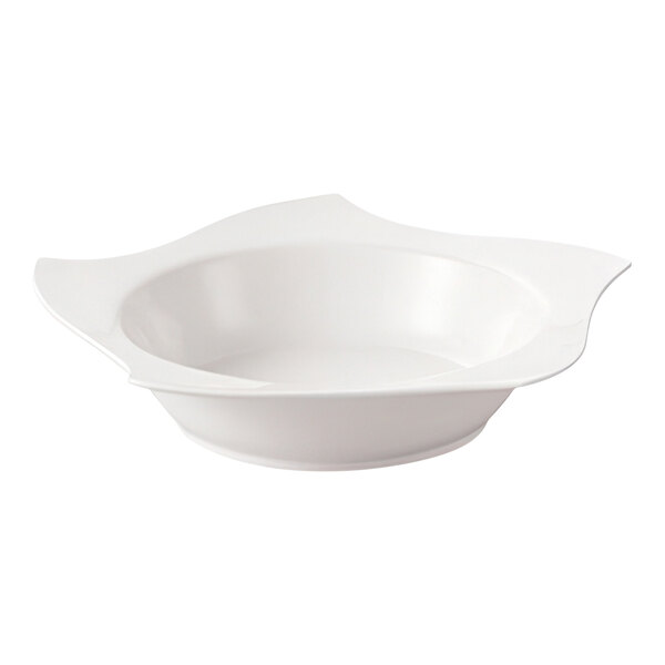 A CAC white porcelain pasta bowl with a curved edge.