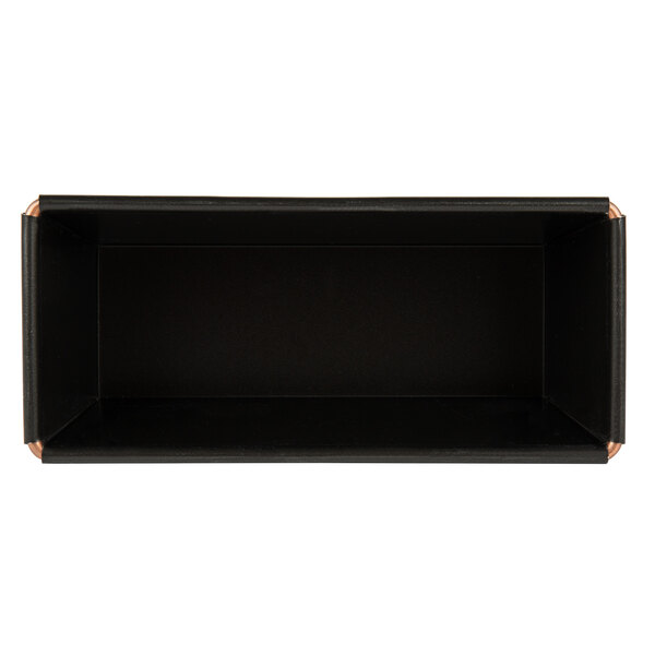 A black rectangular Matfer Bourgeat bread loaf pan with a brown handle.