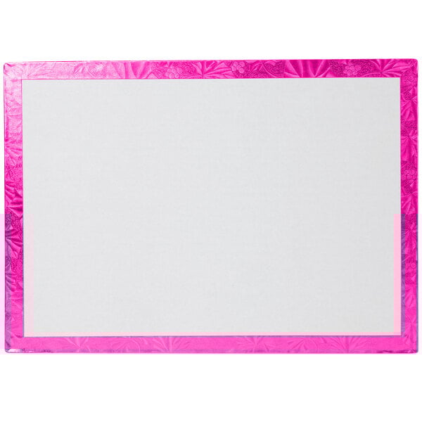 A white cake board with a pink border.
