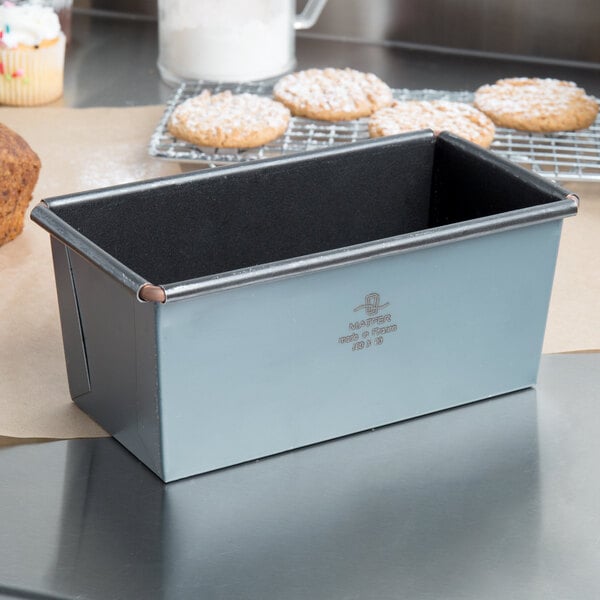 A Matfer Bourgeat steel non-stick bread loaf pan on a counter.