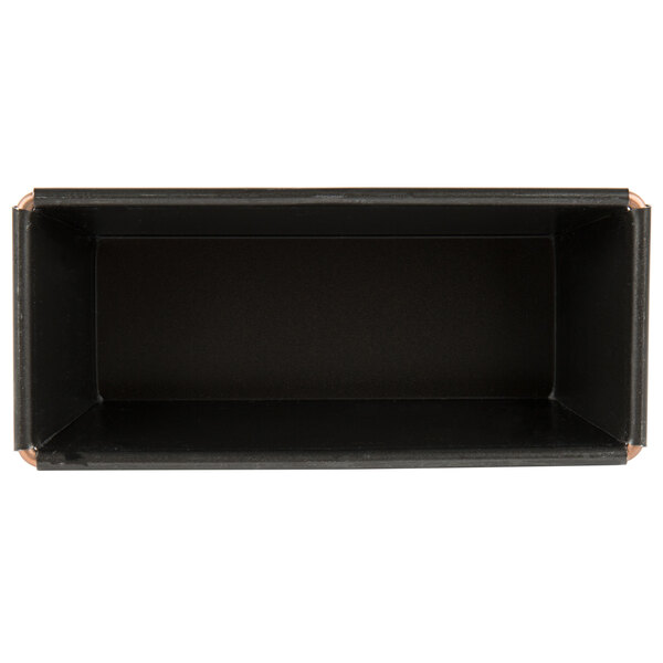 A black rectangular Matfer Bourgeat bread loaf pan with a metal handle.