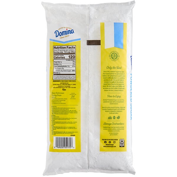 A yellow package of Domino 10X Confectioners Powdered Sugar with black text on it.