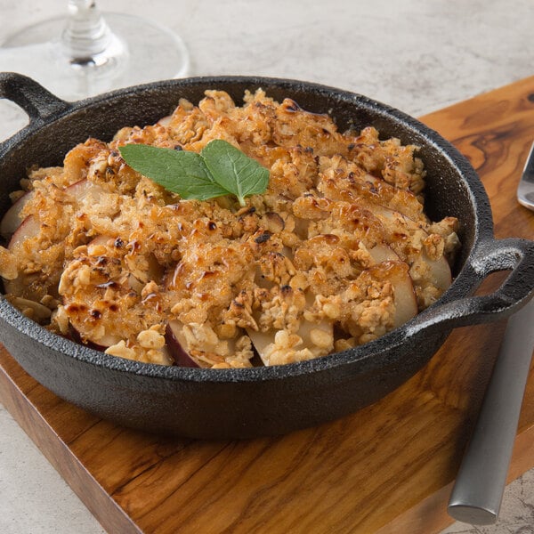 A pan of food made with Domino Light Brown Sugar on a cutting board.