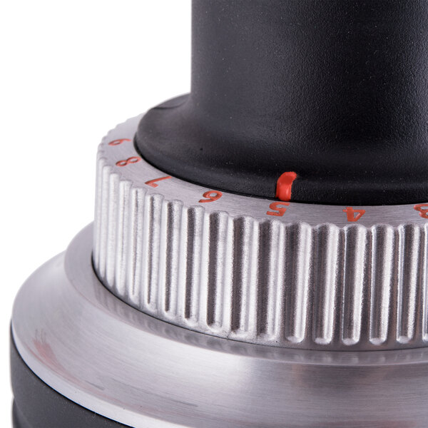 A KitchenAid immersion blender with a dial on the top.