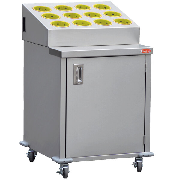 A Steril-Sil stainless steel silverware cart with yellow cylinders on top.