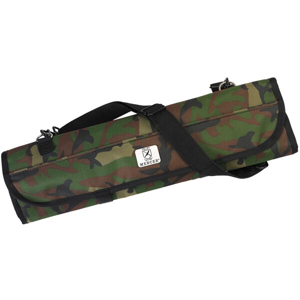 A camo bag with a black strap and a zipper.