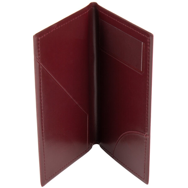 A burgundy leather Menu Solutions guest check presenter with a credit card pocket.