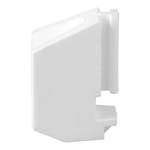 A close-up of a white plastic clip for a corner.