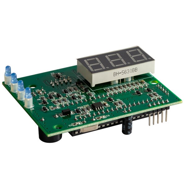 A green circuit board for VacPak-It VMC16 and VMC32 machines with a digital display.