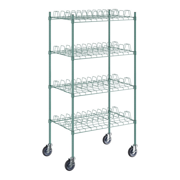A green metal Regency wire rack with casters.