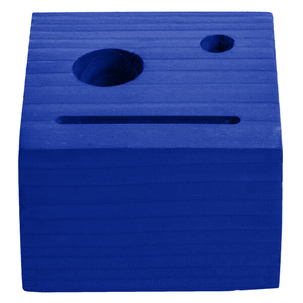 A blue wood block with a hole in the top.