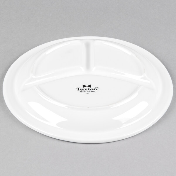 a white plate with three sections