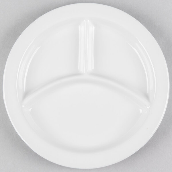 A white Tuxton china plate with three compartments.