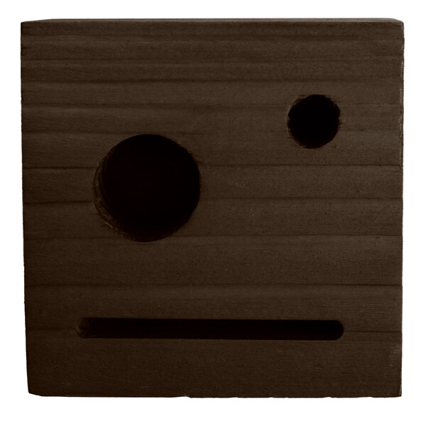 A dark wood block with a hole in the middle.
