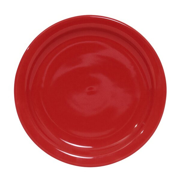 A red Tuxton Healthcare China plate.