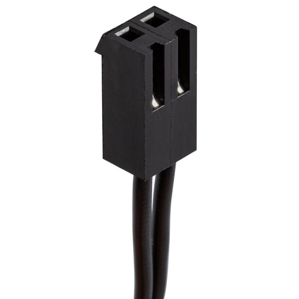 A black VacPak-It micro switch with two slots and two wires attached.