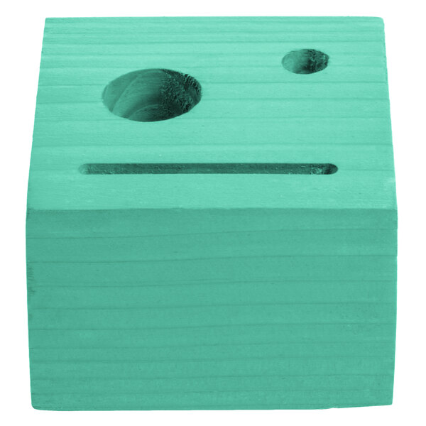 A teal wood block check presenter with a hole in it.