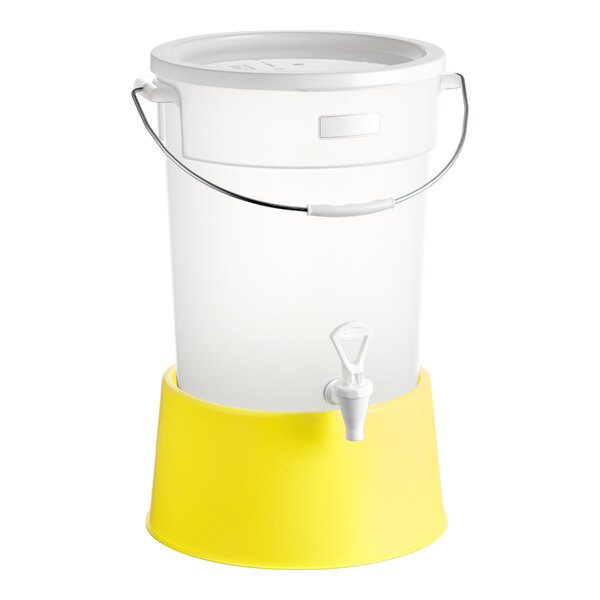 A round 6-gallon translucent beverage dispenser with a yellow base and a spigot.