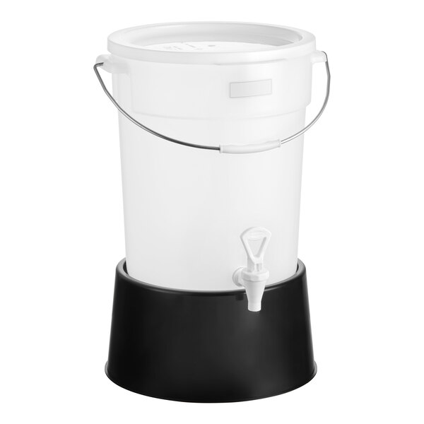 A round 6-gallon translucent beverage dispenser with a black base and a spigot.