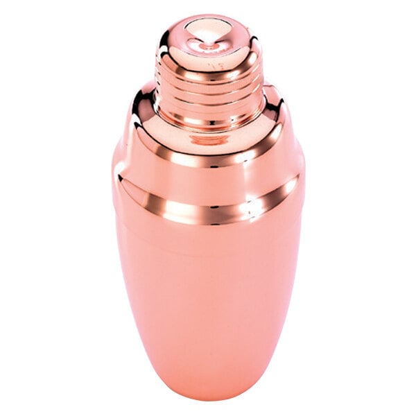 A close-up of a copper Barfly cobbler cocktail shaker with a lid.