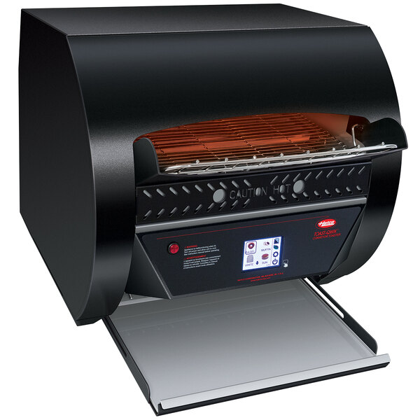 A black Hatco commercial conveyor toaster with digital controls.