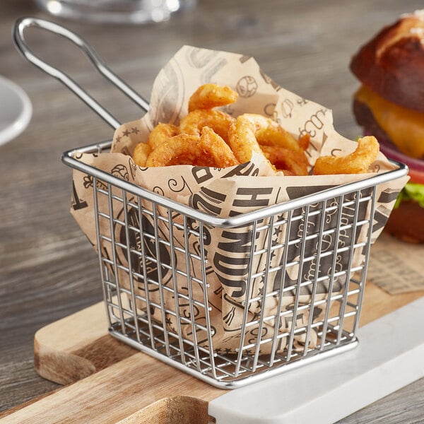 An American Metalcraft stainless steel mini square fry basket with fries and a cheeseburger on a cutting board.