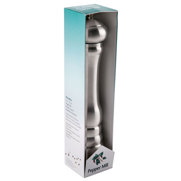 A Chef Specialties stainless steel pepper mill in a box.