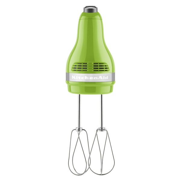 A KitchenAid green and silver hand mixer with stainless steel whisks.