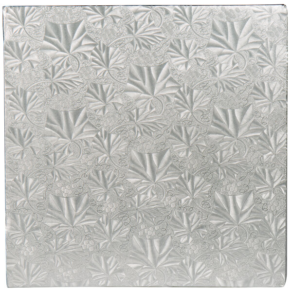 A silver square Enjay cake drum.