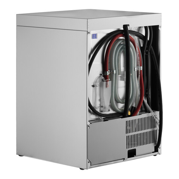 A commercial undercounter dishwasher with visible hoses and connections on the back panel.