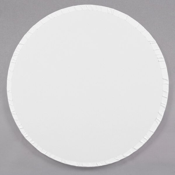 A white round Enjay cake drum with a white edge.