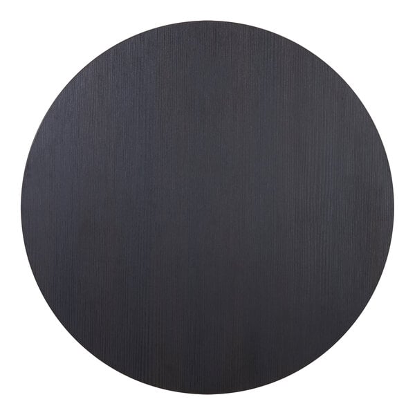 A black circle table top on a table.