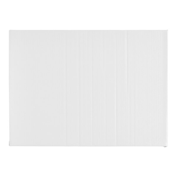 A rectangular white cake board with fold-under edges and a thickness of 1/2 inch.