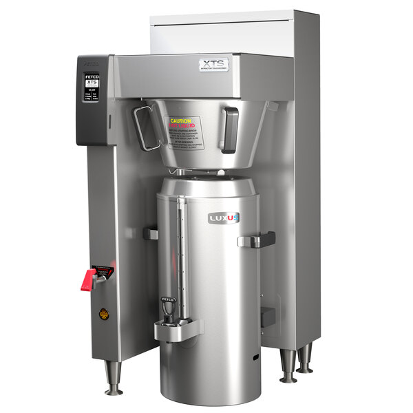 A Fetco stainless steel commercial coffee brewer.