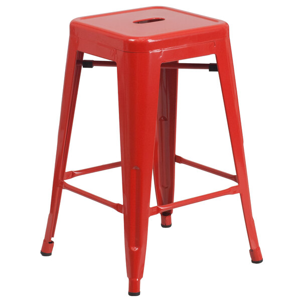 A red Flash Furniture metal counter stool with square drain seat.