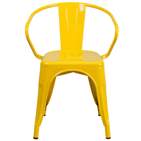 A yellow Flash Furniture metal chair with arms and a slatted back.