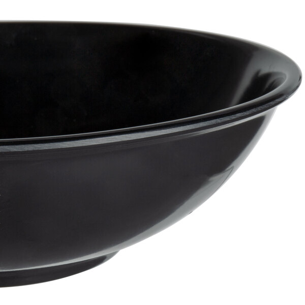 A close-up of a black Vollrath melamine serving bowl.