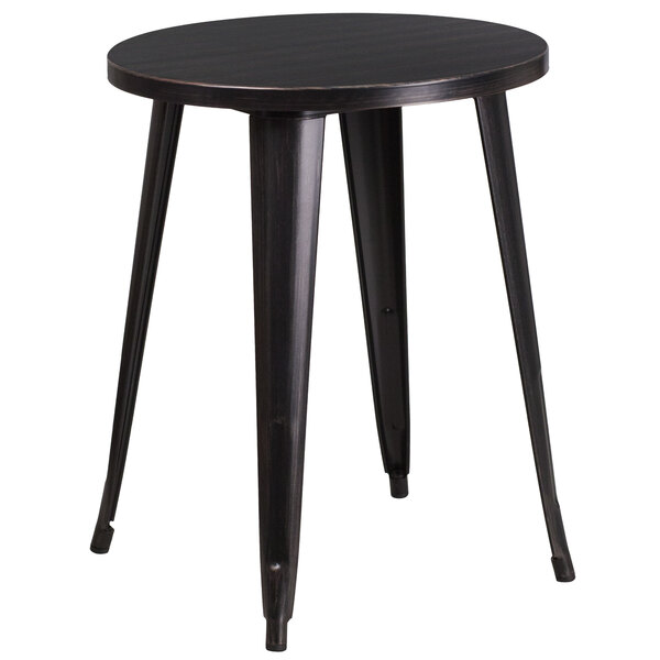A black round metal table with legs.