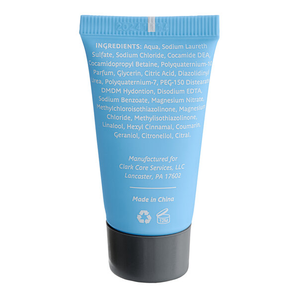 A blue plastic bottle of Lavex Hotel and Motel shampoo with white text.