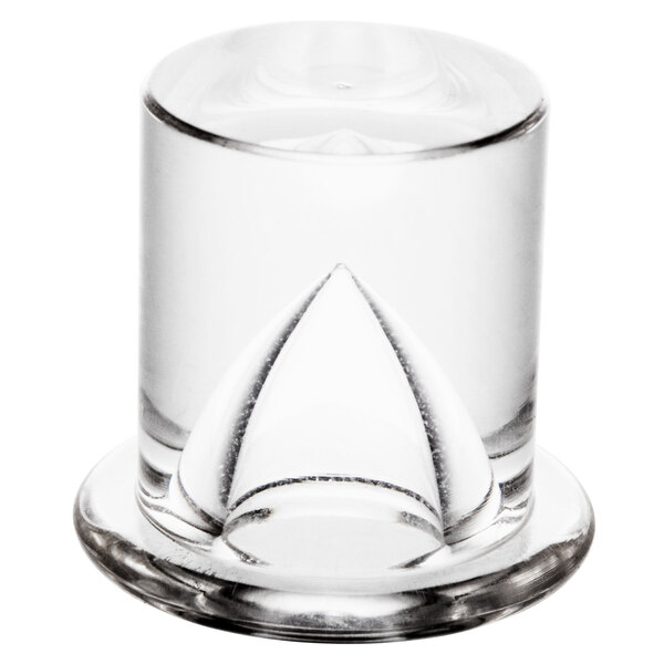 A clear glass with a triangle shaped base filled with ice cubes.