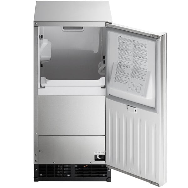 A Hoshizaki undercounter ice machine with its door open.