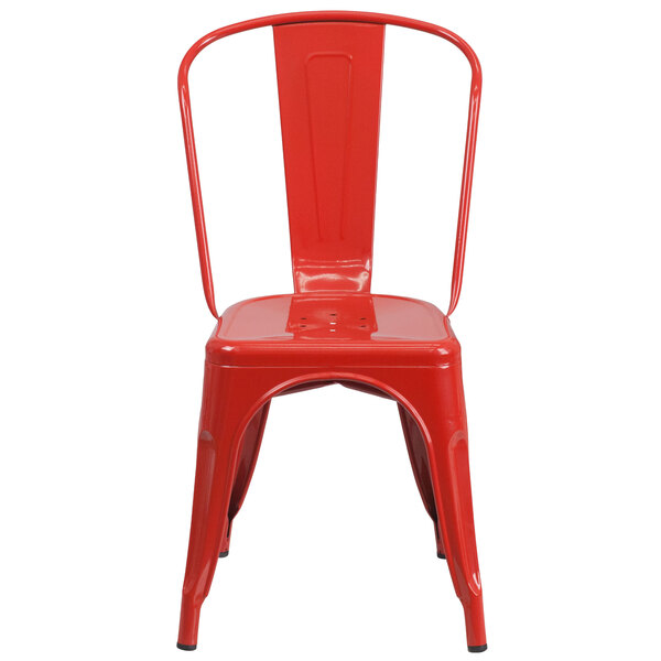 A red Flash Furniture metal outdoor restaurant chair with a vertical slat back and drain hole seat.