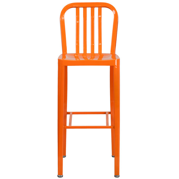 An orange metal bar stool with a vertical slat back and legs.