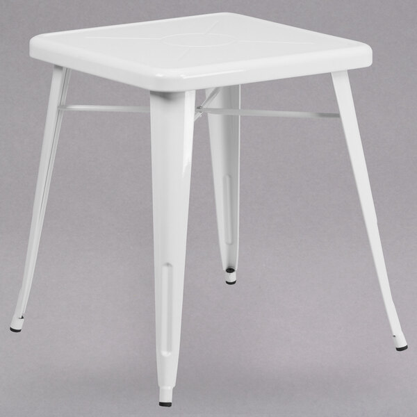 A Flash Furniture white metal square cafe table with legs.